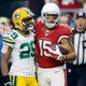 Arizona wide receiver Michael Floyd and Green Bay cornerback Casey Hayward share a moment of loving friendship and tender goodwill during the teams’ Week 16 matchup last month, which Arizona won 38-8. (Photo: Arizona Cardinals)